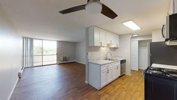 Hardwood-style flooring in kitchens and living areas